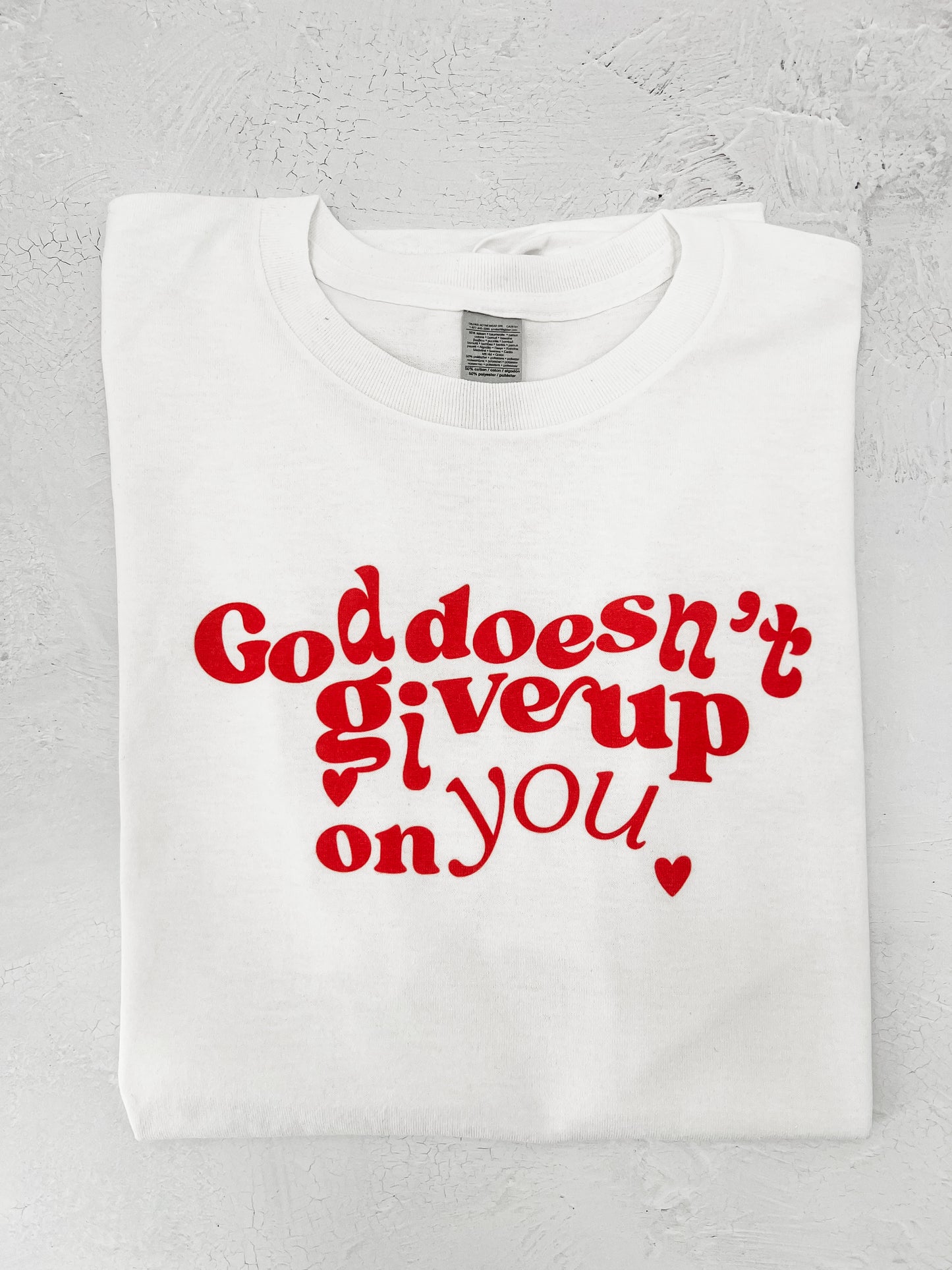 God Doesn't Give Up on You Tee
