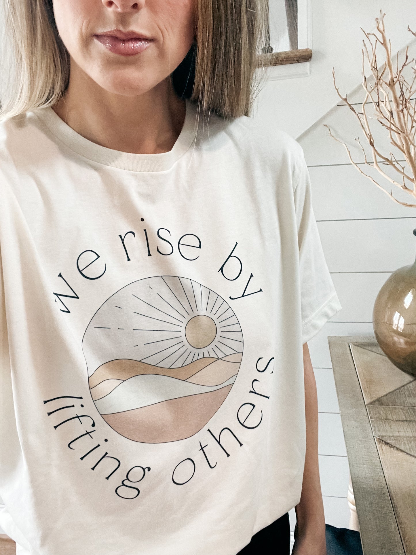 We Rise by Lifting Others Tee